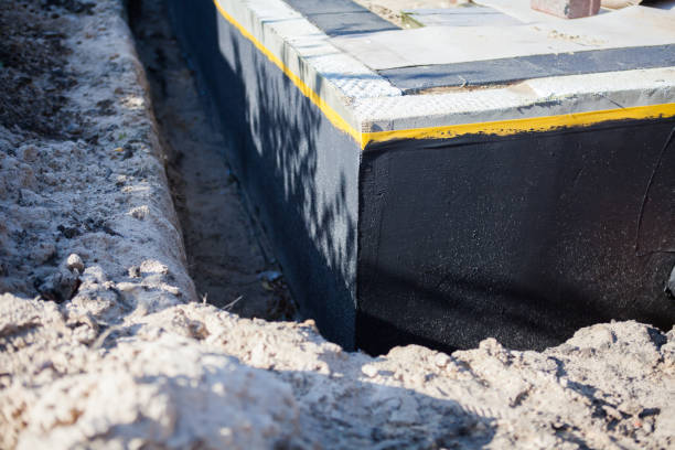 Professional Basement Waterproofing technician working in Omro, WI